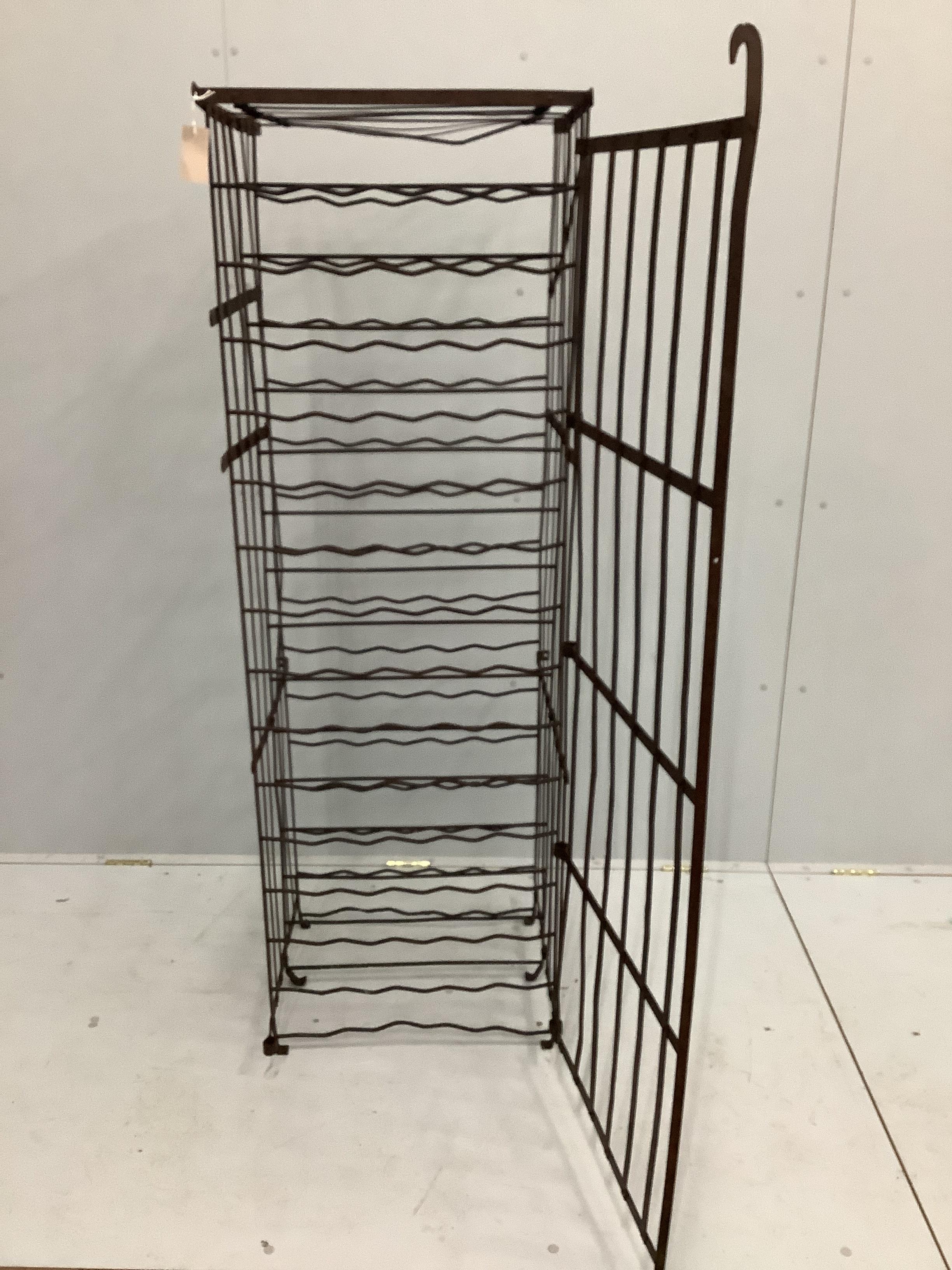A French wrought iron wine cage, width 53cm, depth 58cm, height 165cm